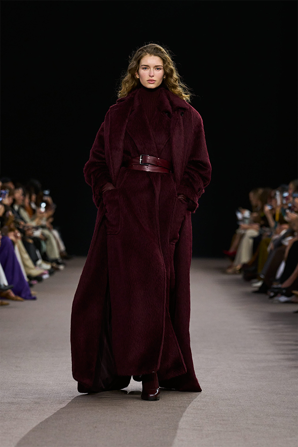 Max Mara Fall/Winter 2025 Fashion Show - Cherry Look with Long Coat, Sleeveless Coat, Belt, Leggings and Mary Janes.